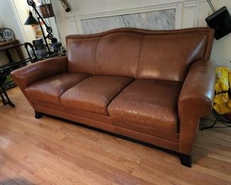 Tan, real leather sofa by Hickory Chair. With matching chair with footrest