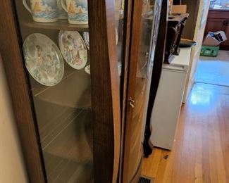 antique curved glass cabinet