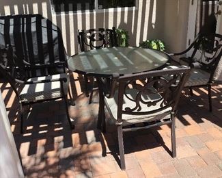 Cast aluminum patio table and four chairs $500. Text Steve at 619-540-9414