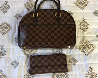 Louis Vuitton handbag not authenticated $90. Text Steve at 619-540-9414