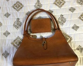 Dooney and Bourke handbag $60. Text Steve at 619-540-9414