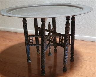 Vintage Egyptian Brass Top Foldable Tray Table w/
Hieroglyphics
Brass Top with Foldable Wood Base