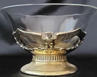 Brass Eagle Stand holding Clear Glass Bowl
