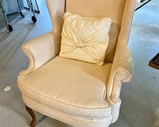 White upholstered wingback chair
$50