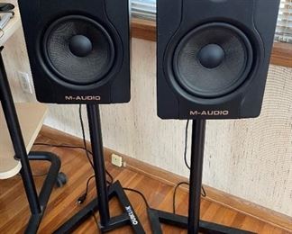 M-Audio speakers on stands