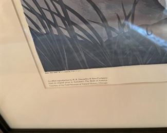 A framed reproduction of an engraved plate by R. R. Donnelley & Sons Company