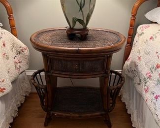 Rattan table with magazine holders