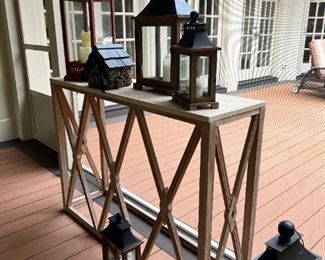 Lantern collection and wood console with stone top