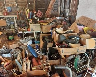 LOTS OF BIKE PARTS WHICH WILL BE SORTED AND DISPLAYED OUTSIDE