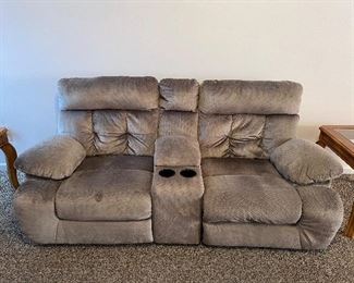 Powered reclining sofa