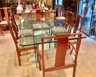 Glass top table and 8 chairs 