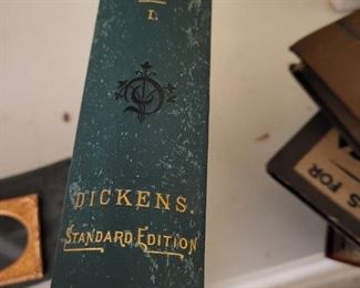 Charles Dickens first print standard edition of bleak house . There are many other first editions and old books.