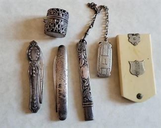 1800s and early 1900s sterling knives and pocket accessories.
