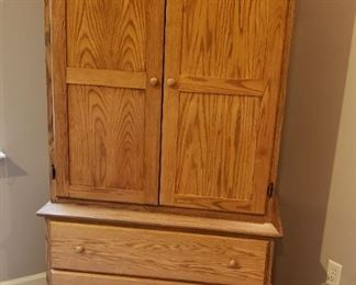 Amish made oak Armoire with cedar shelves and two drawers.  