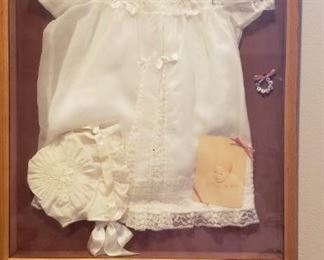 Framed baby christening gown