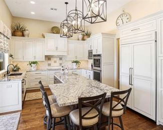 Four genuine leather swivel counter stools $200 per chair 