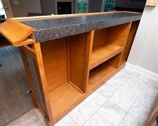 Custom Built Bar 96” x 22.5” (widest point) — 85.25” X 17” (top of bar surface area) — 44” countertop height — 85.5” wide at sides 