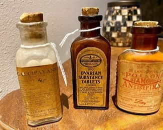 Antique medicine bottles, look at the center one Ovarian Substance Tablets !!!!!