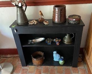 More great collectibles and large display Shelf in dark blue
It was on the wall and we took it down.