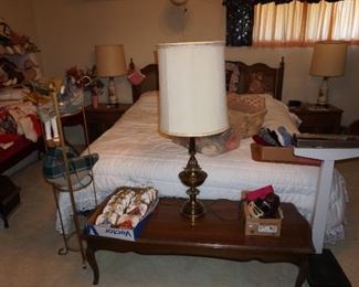 coffee table,  plant or decor stand, lamps, scales, king bed