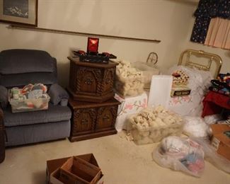 recliner, side tables, stuffed animals, twin bed