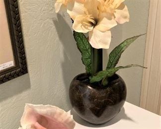 Shell; floral arrangement