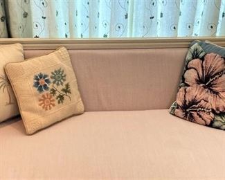 Loveseat with decorative pillows