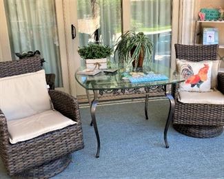 Swivel patio chairs; glass top table