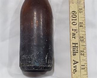 ca1905 Straight sided amber Coca Cola bottle from Chattanooga Tennessee.  Lots of old soda bottles in this sale, mostly from Texas. 