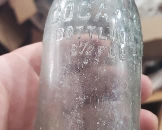 Austin Texas straight sided Coca Cola soda bottle.  Several old straight sided coke bottles in this sale. 
