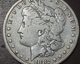 Several Morgan silver dollars in this auction. 