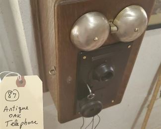 1914 Graybar oak wall mount telephone with hand held speaker. 