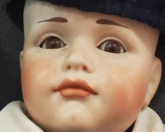 Strung body porcelain doll marked Marsha Dolls, Star of David. 