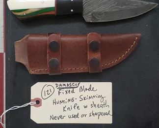 Fixed blade hunting knife w damascus hand forged blade, leather sheath. 