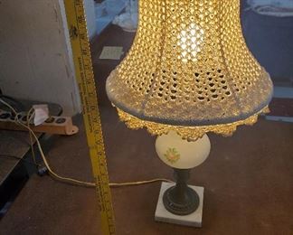 Antique lamp on marble base with handmade crochet shade. 