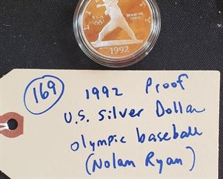 1992 proof US silver dollar.  Controversial coin featuring the likeness of Texas Rangers pitcher Nolan Ryan as posing on a 1981 Fleer baseball card.   It is illegal to put a living person on a US coin therefore this coin caused quite a stir. 