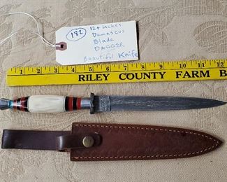 Huge fixed blade bowie sized dagger knife with Damascus hand wrought blade measuring over 12 inches long with leather sheath. Never sharpened.  No markings but probably made by Cutlery Salvation. 