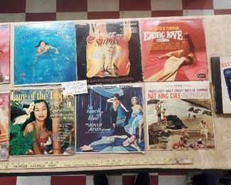 Old risque record albums from the old vinyl days.  The one at far right is 78rpm, Naughty Nineties.   The others are 38rpm.  The one at top left has a Nancy Sinatra record inside (not the correct album cover). 