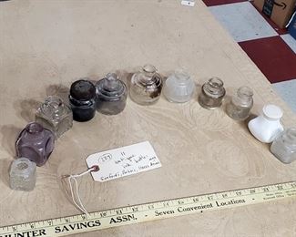 11 antique ink bottles