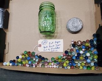 fruit jar with old marbles