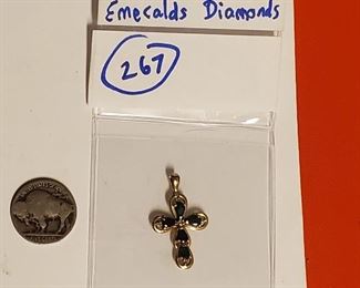 18k gold cross pendant w emeralds, diamond.  Diamond tests genuine. 