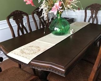Dining Room table with leaf and six chairs.  Only used a few times.  Like new!