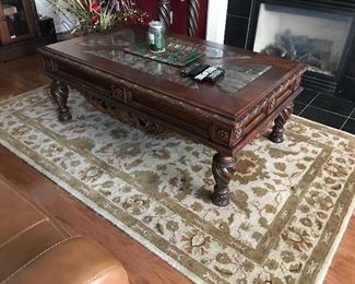 Large cherry coffee table with inset granite on top