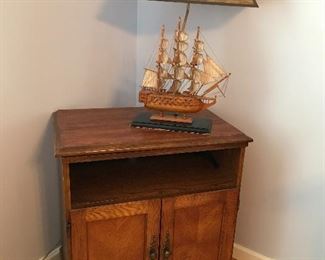 Cherry tv stand with ship lamp with map shade. 
