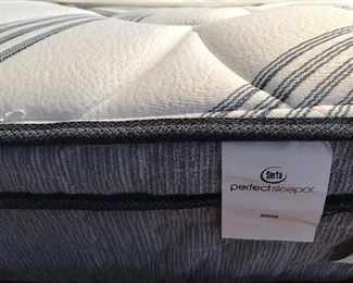 6 month old queen pillow top mattress - in plastic - like new