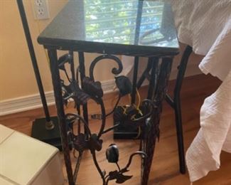 #17B - $100- Pair of iron botanicals side table, nesting with marble tops 