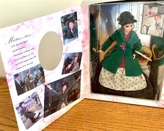 Many collectible Barbies and other collectible figurines   with original packaging-  Eliza from My Fair Lady