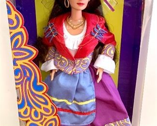 Many collectible Barbies and other collectible figurines   with original packaging- Italian Barbie