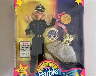 Many collectible Barbies and other collectible figurines   with original packaging- Police  Officer Barbie