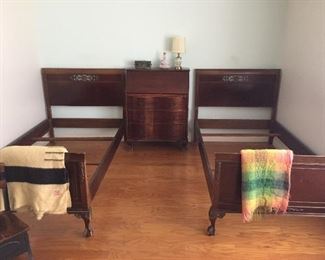 Beautiful, antique twin beds and drop front desk.